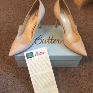 Cream colored, pointed toe Butter Heels